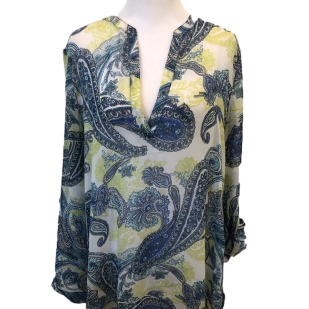 Chico’s Size 1 sheer paisley pull over top. Roll tab sleeves. Hi-lo hem. V-neck
